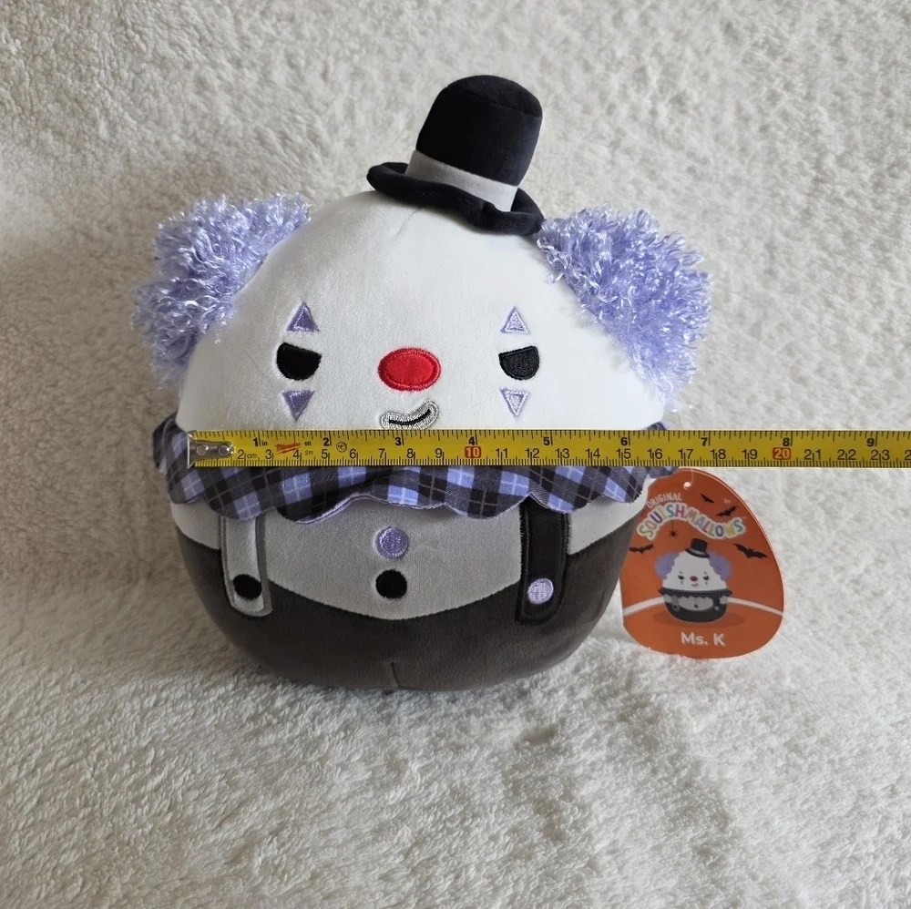 Squishmallows Official 8 inch Ms. K the White Clown with Violet Hair plush toy